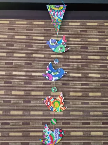 FLY BIRD SHAPED BUNTING WITH TASSEL FLY BIRD SHAPED BUNTING WITH TASSEL