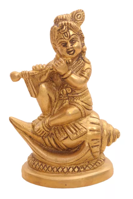 Brass Krishna Statue: Bala Gopal Avatar Seated On Holy Conch Panchajanya Shankh (10920)