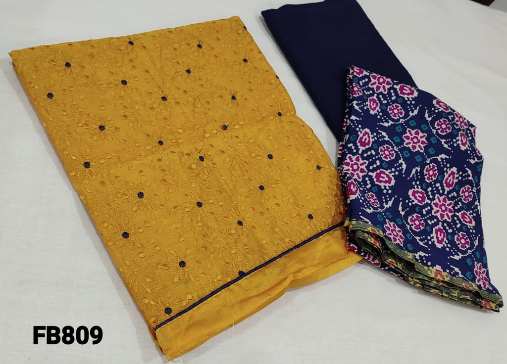 CODE FB809 : Dark fenu Greek Yellow Silk cotton unstitched Salwar material(thin fabric requires lining) with Heavy Embroidery work on front side, Plain back, Navy Blue cotton bottom, Patola Printed Soft Chiffon dupatta(Taping needs to be  stitched)
