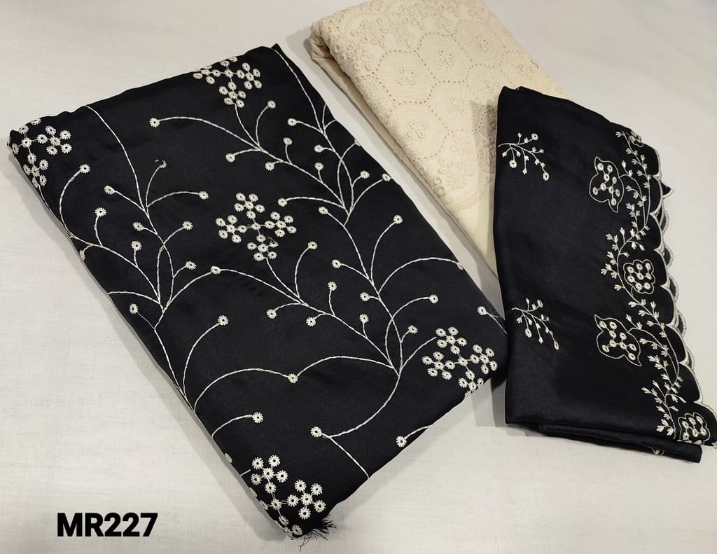 CODE MR227: Black Silk Cotton Unstitched Salwar material(silky fabric, requires lining) with heavy embroidery work on front side,  half white khadhi cotton bottom with embroidery,  embroidery work on silk cotton dupatta with cut work.