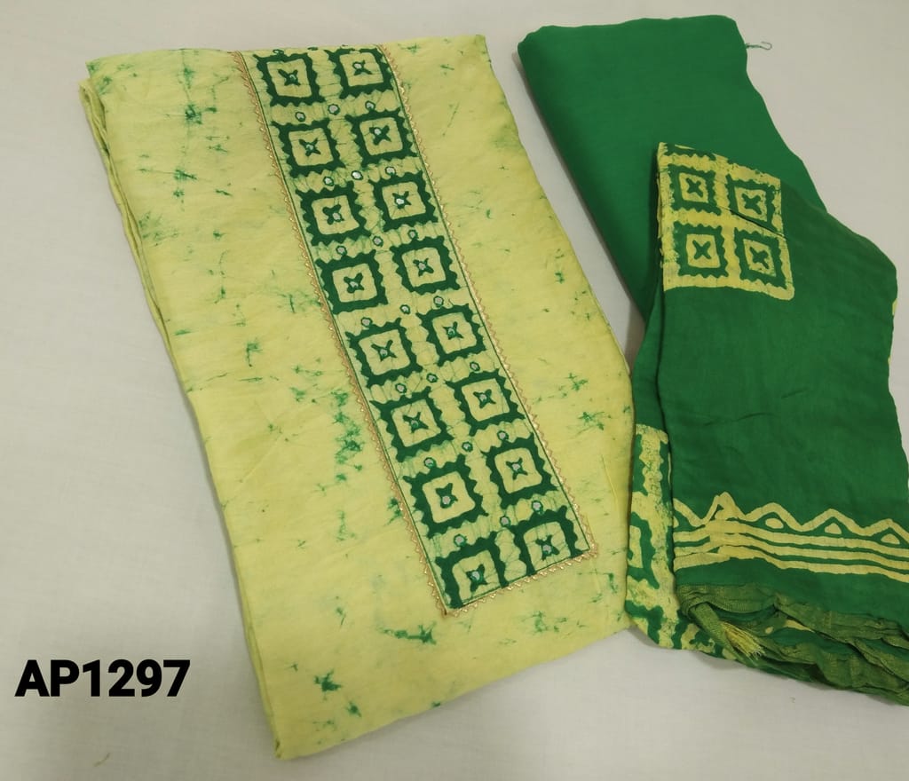 CODE AP1297 : Pastel Yellow soft Silk Cotton unstitched Salwar material with pure wax batik dyed (requires lining) with faux mirror and gota lace work on yoke, green cotton bottom, batik dyed soft silk cotton dupatta with zari lines.