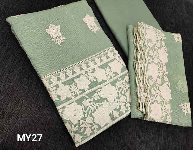 CODE MY27 : Green Noil fabric unstitched Salwar material( Netted fabric, Requires lining) with embroidery work on frontside and daman, thin cotton fabric provided which can be used as lining or bottom, embroidery work on noil (netted fabric) dupatta with lace tapings.