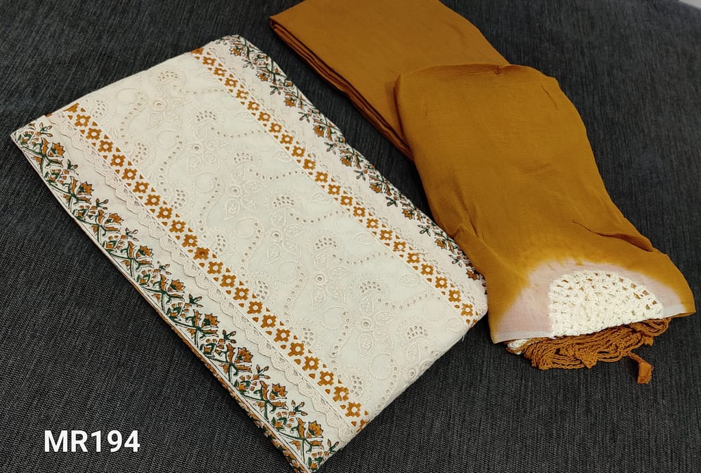 CODE MR194  : Designer Half White block printed Khadhi Cotton unstitched Salwar material( requires lining) with crochet detailing and lace work on front side, Mehandhi green soft drum dyed cotton bottom, Dual shaded chiffon dupatta with beautiful crochet work and crochet tapings.