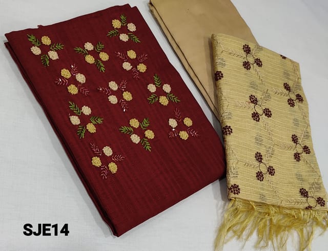CODE SJE14: Designer Maroon Jakard Silk Cotton unstitched Salwar material(lining required) with French knot and cut bead work on yoke, beige silk cotton bottom, embroidery work on kota silk cotton dupatta with tassels.