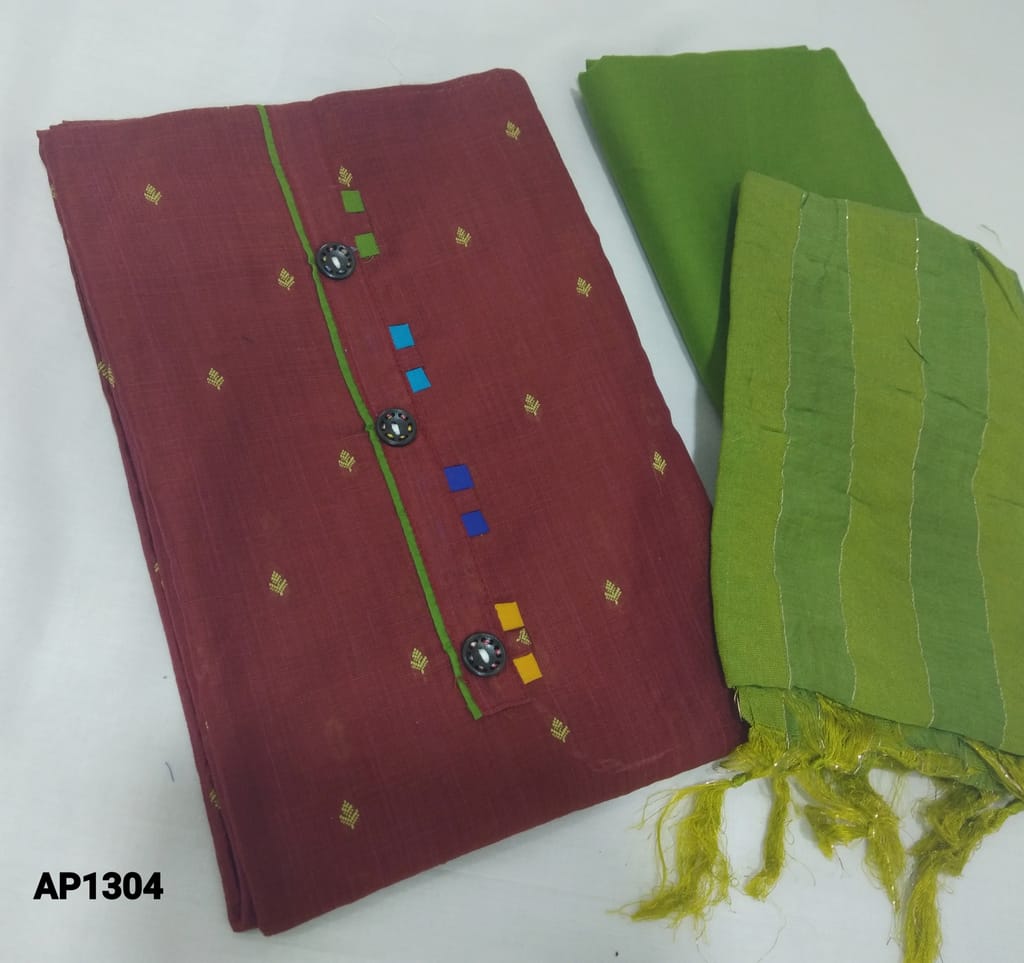 CODE AP1304 : Maroon Silk cotton unstitched Salwar material(lining optional) with thread woven embroidery allover, potli buttons on yoke, green cotton bottom, zari lines on fancy silk cotton dupatta(requires taping)