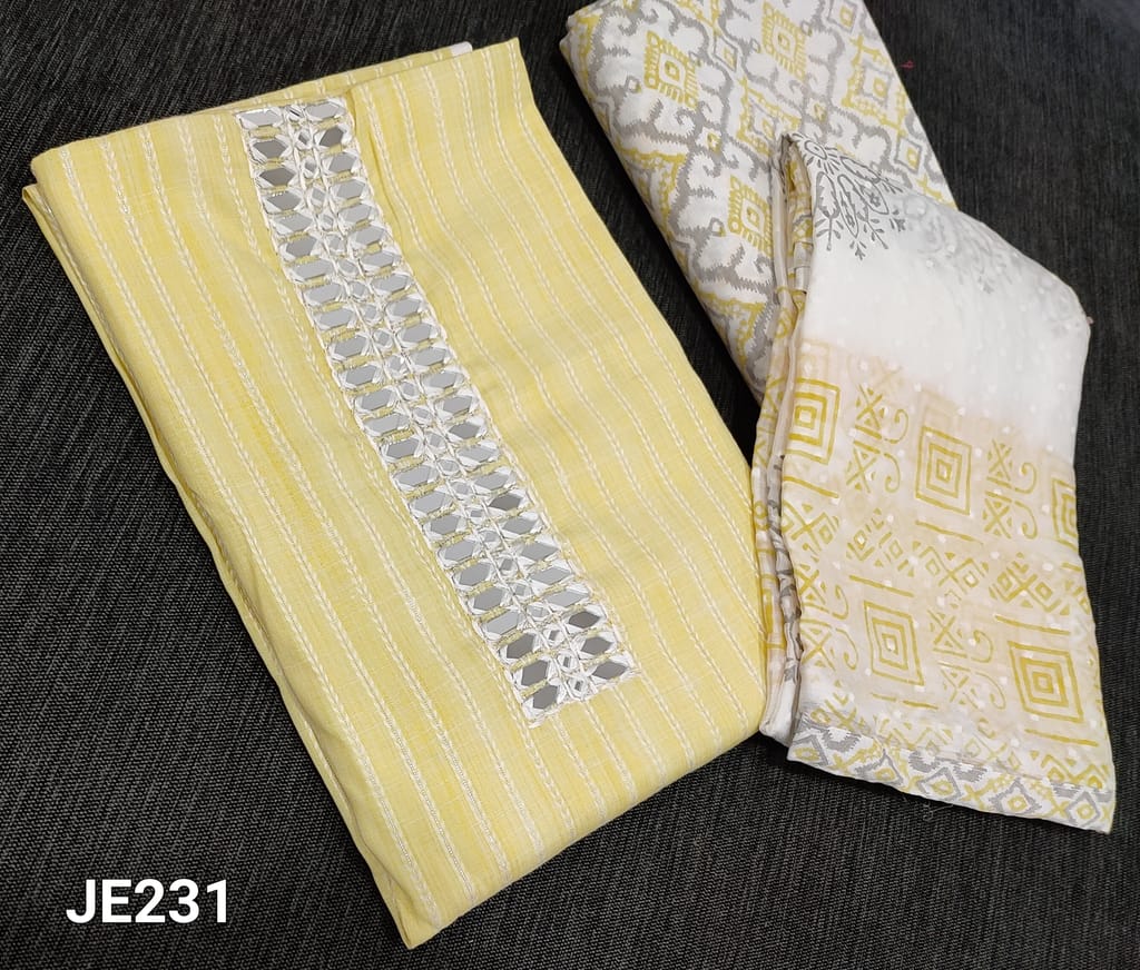 CODE JE233: Pastel Yellow soft Spun Silk Cotton unstitched salwar material(lining required) with vertical silver zari lines, real mirror work on yoke, printed cotton bottom, block printed and thread work on chiffon dupatta with tapings