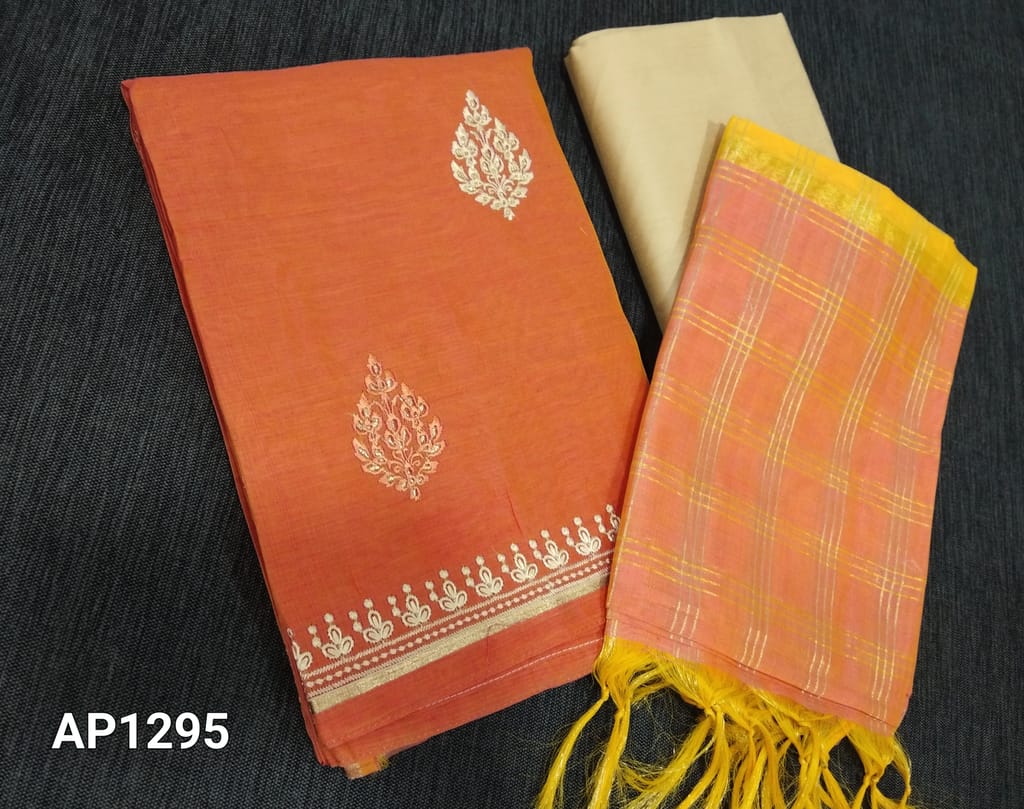 CODE AP1295 : Peach Silk Cotton unstitched salwar material( requires lining) with zari and thread work on frontside, beige silk cotton bottom, checks zari lines on  fancy silk cotton dupatta with tassels