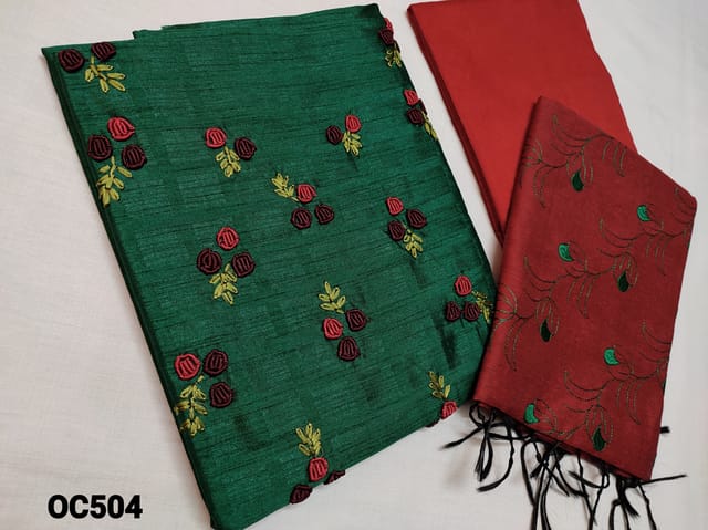 CODE OC504 : Designer Green Jaquard Silk Cotton unstitched salwar material(coarse fabric, requires lining) with Thread Embroidery work on yoke, Red santoon or silk cotton bottom, embroidery work on Silk cotton dupata with tassels