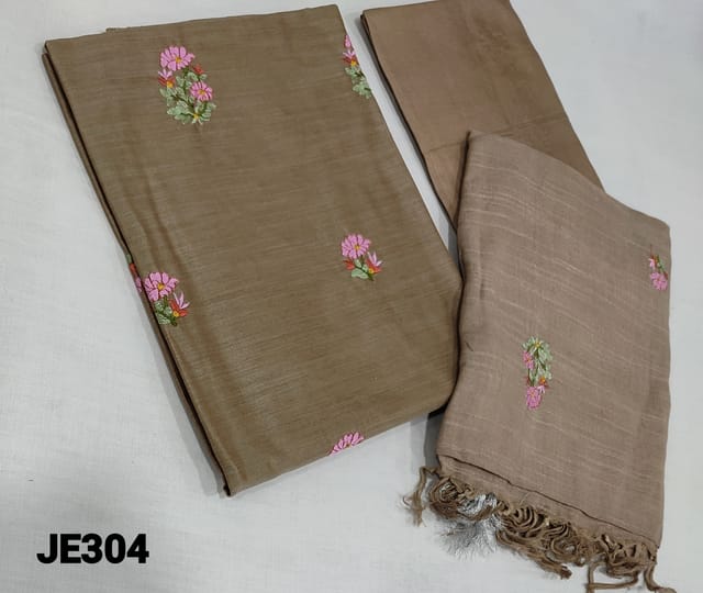 CODE JE304 : Beige fancy Silk Cotton Unstitched Salwar material(slightly course fabric, requires lining) with colorful embroidery work on frontside, matching silk cotton or cotton bottom, colorful embroidery work on linen cotton dupatta with silver zari borders and tassels