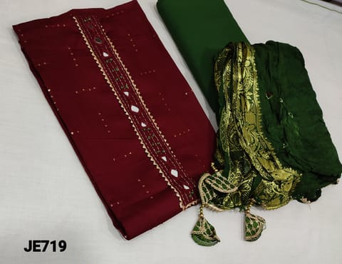 CODE JE719 : Designer Maroon Satin Cotton unstitched Salwar material(requires lining) with thread and sequence work on frontside, real mirror and gota lace work on yoke, green soft thin cotton bottom, bandini tie and dye crinkled fancy silk dupatta with zari borders and fancy tassels.(tassels color might vary)