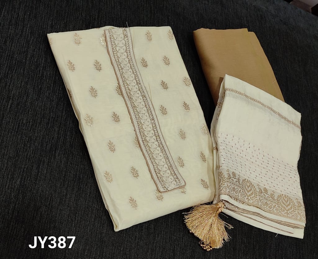 CODE JY387 : Designer Ivory Silk Cotton unstitched Salwar material(requires lining) with zari woven design on frontside, plain back, beige silk cotton bottom, zari weaving soft silk cotton dupatta with tassels