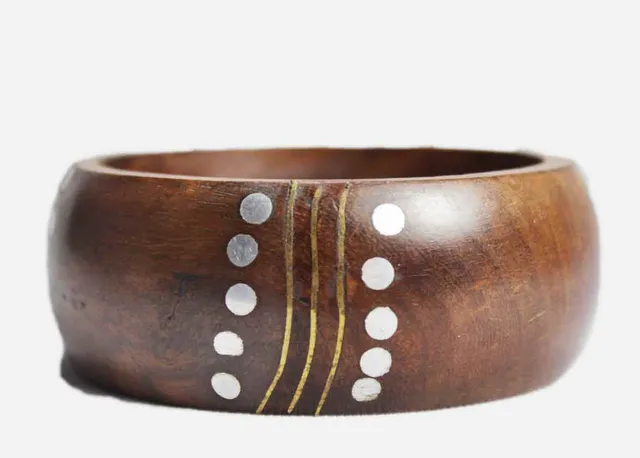 Tribal and hipster look grand chic simple presented voguish elegant and fleek type youthful wood bangle