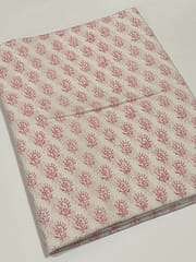 White colored cotton fabric with red design print