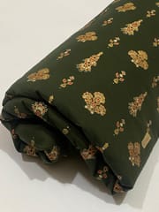 Green base fabric with design