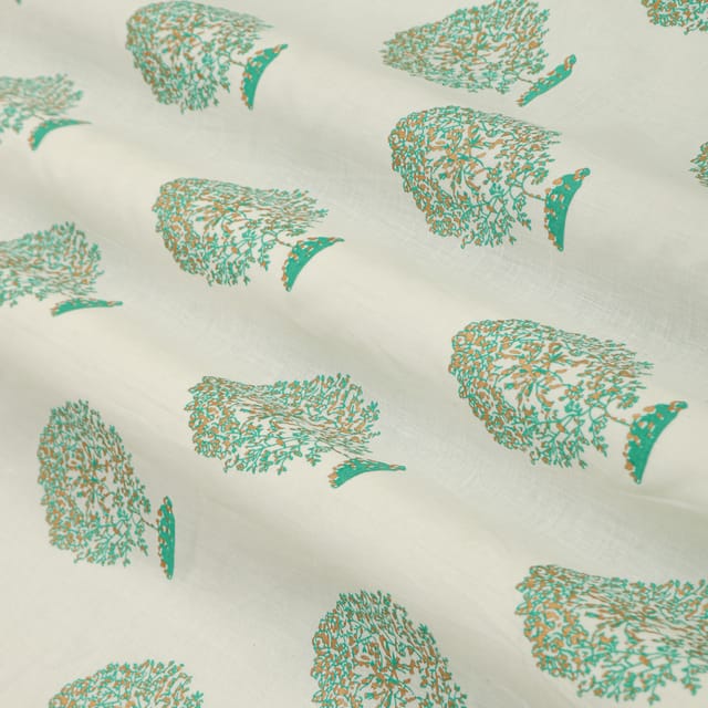 Snow White with Green and Gold Motif Print Cotton Fabric