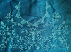 Teal Blue Beautiful Zari and Resham thread embroidered Net Lehenga